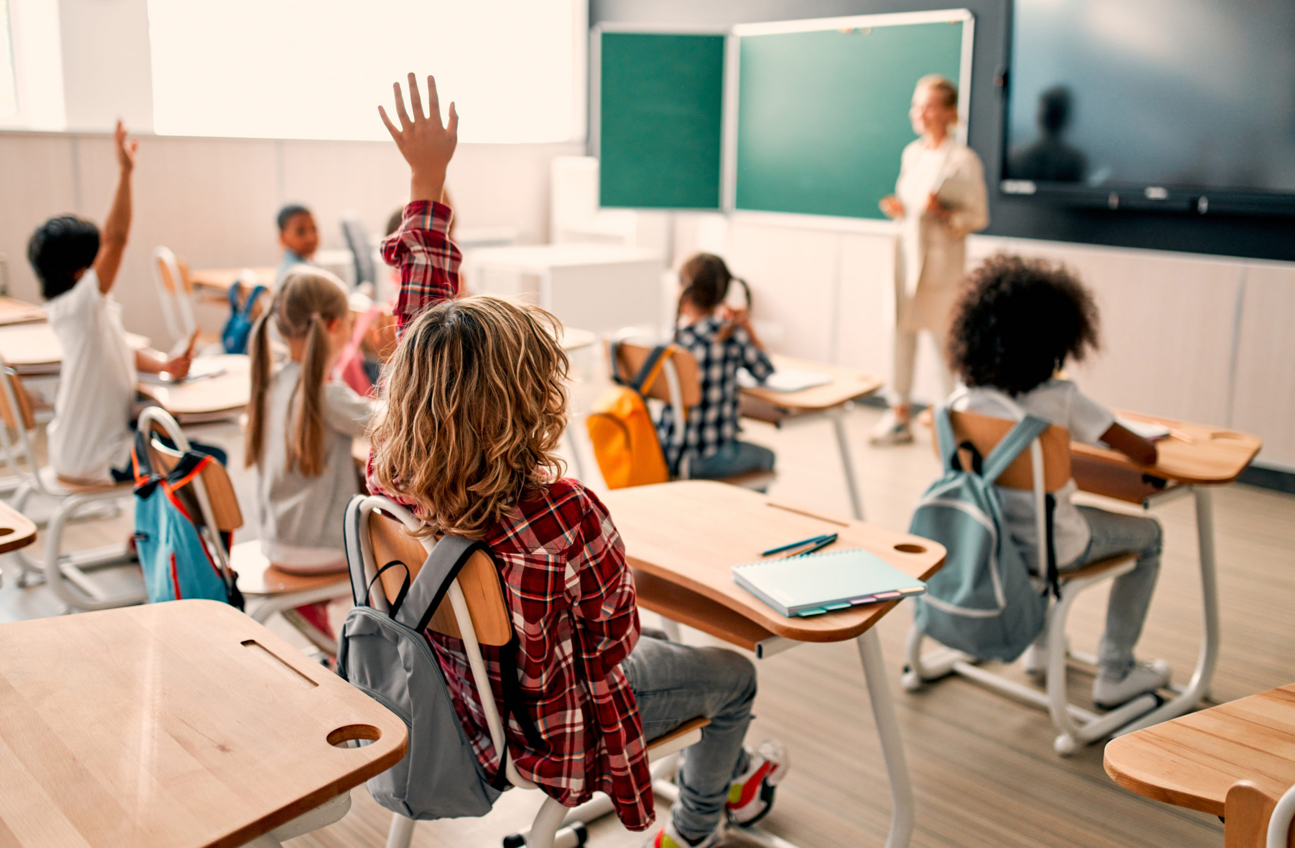 Children in class room with teacher | Bonneville Academy